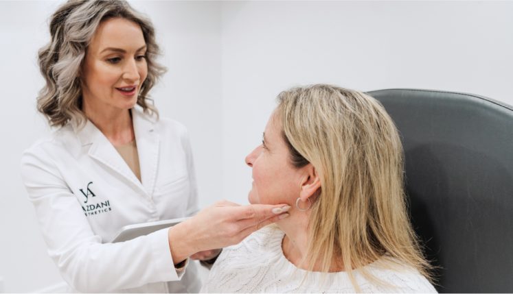a woman looking at her long-lasting neck lift